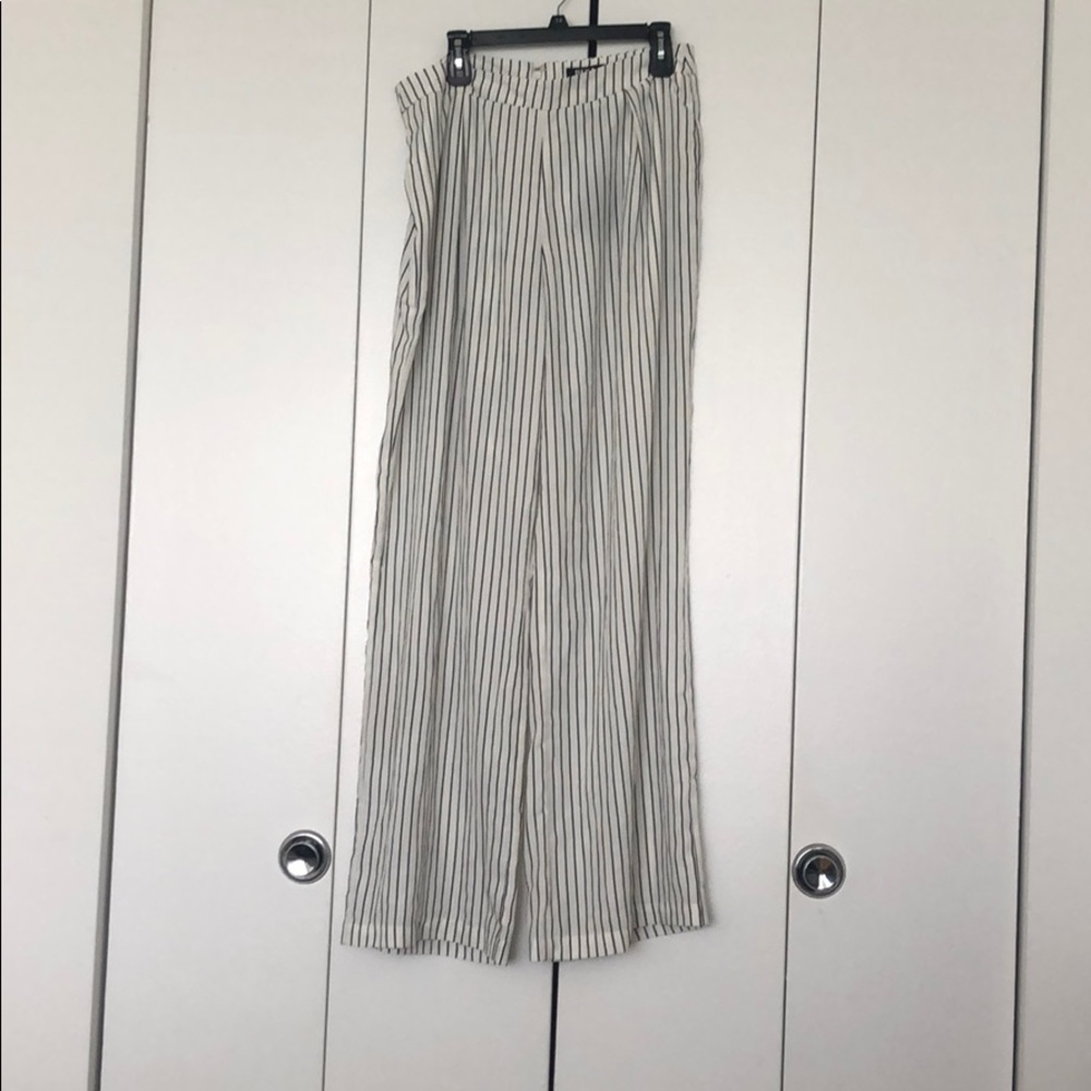 White and black pin striped pants